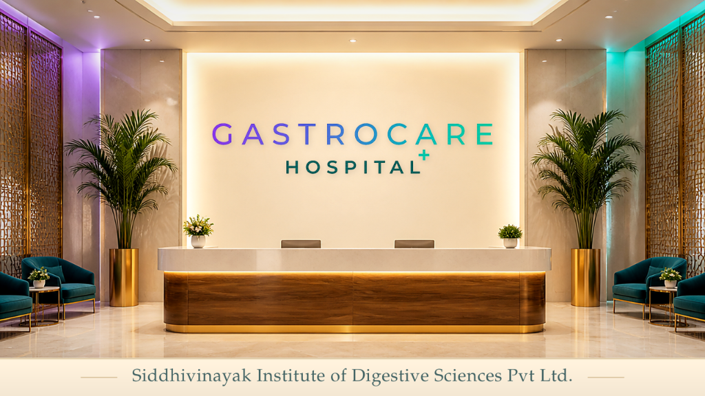 GastroCare Hospital reception and waiting area, with the hospital logo on the illuminated back wall and teal seating